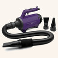 Purple high-velocity dog grooming dryer with hose and nozzles