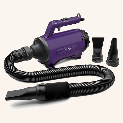 Purple high-velocity dog grooming dryer with hose and nozzles