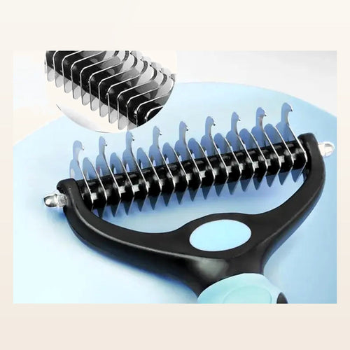 Close-up of double-sided deshedding rake teeth